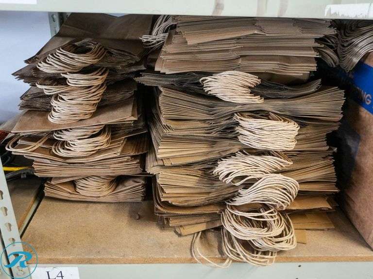 Shelf of Paper Bags - Roller Auctions