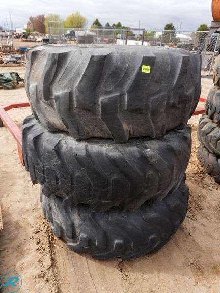 (3) 19.5L-24 Loader / Backhoe Tires With Wheels - Roller Auctions