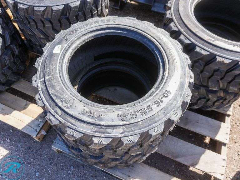 Set of (4) New Forerunner 10-16.5 SKS1 Skid Steer Tires - Roller Auctions