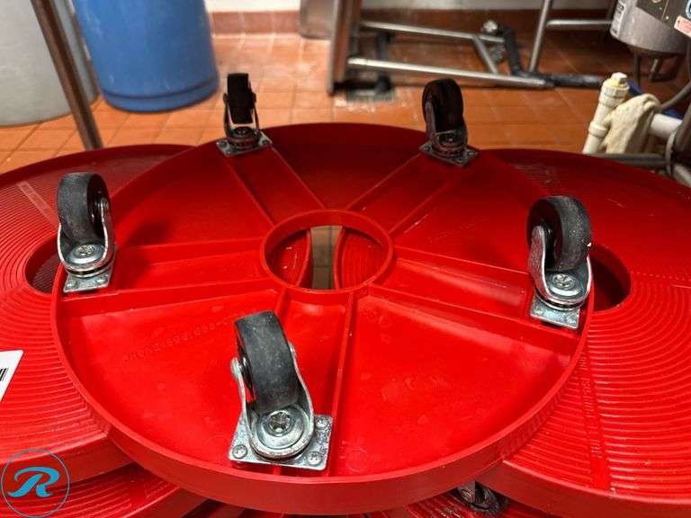 Stacked Red Keg Dollies with Swivel Casters - Roller Auctions