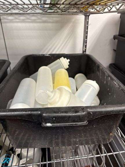 (5) Trays of Plastic Bottles and Sauce Servers - Roller Auctions