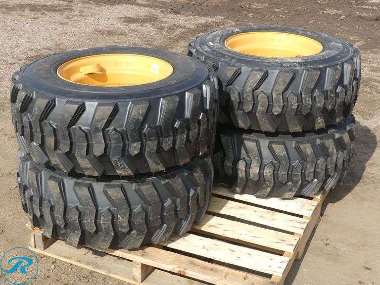 Set of (4) New Forerunner 12-16.5 SKS1 Skid Steer Tires With Wheels, To Fit Case - Roller Auctions