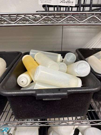 (5) Trays of Plastic Bottles and Sauce Servers - Roller Auctions