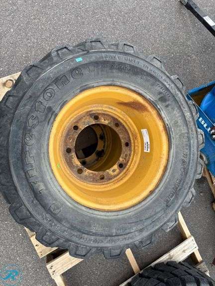 (2) Firestone 12-16.5 Equipment Tires with Wheels - Roller Auctions
