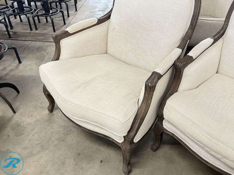 (2) Upholstered Armchairs with Carved Wooden Frames - Roller Auctions