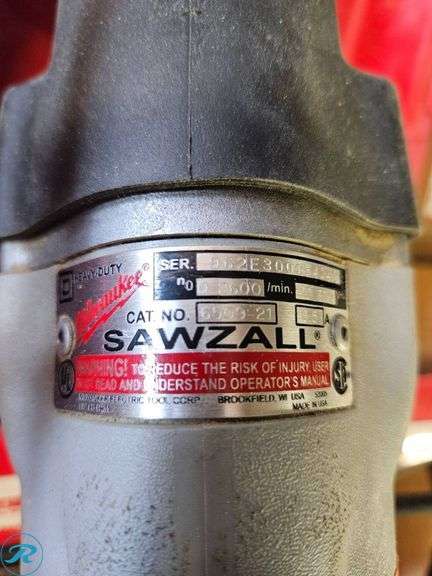 Dewalt DW106 3/8 inch VSR Drill and Milwaukee Sawzall Set in Red Plastic Case - Roller Auctions