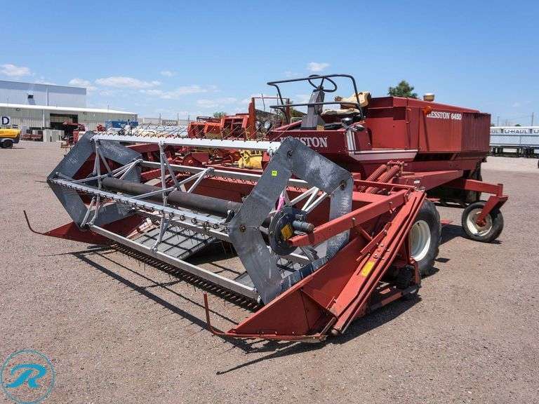 Heston 6450 Swather, ( Unit has a Blown Hydraulic Hose And Needs Replaced)