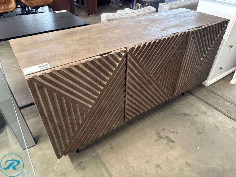 Wooden Cabinet With Geometric Carved Front Panel, 58 in x 18 in - Roller Auctions