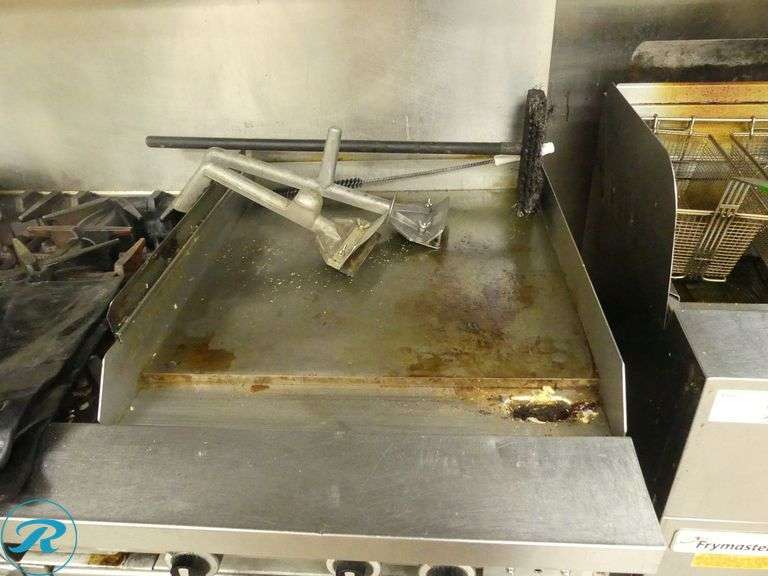 Garland 6-Burner Range With Double Oven and 2-Burner 24" Griddle on Casters, Gas - Roller Auctions