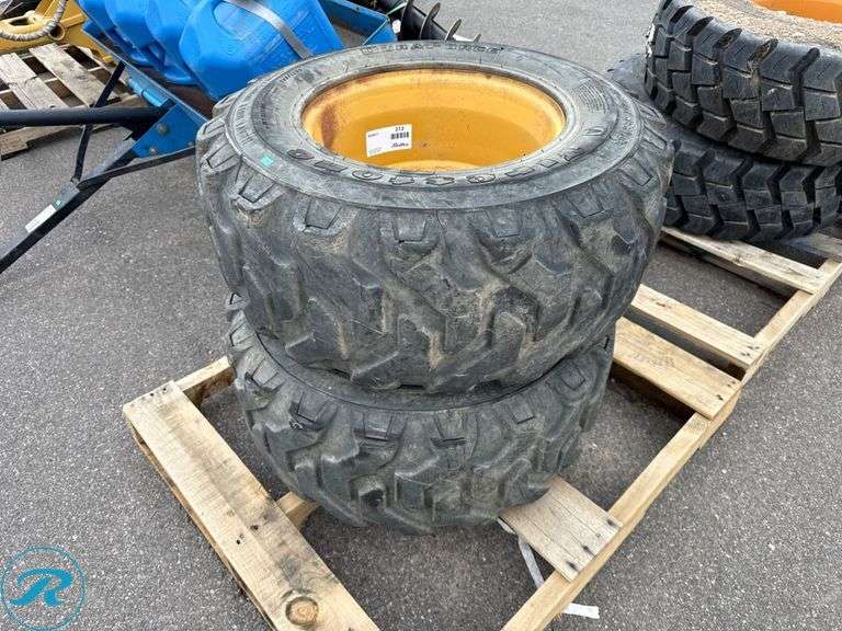 (2) Firestone 12-16.5 Equipment Tires with Wheels - Roller Auctions