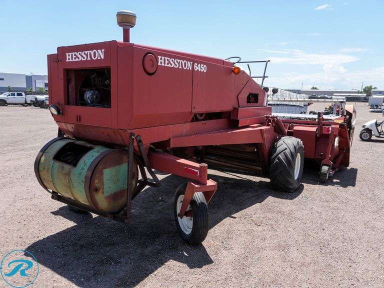 Heston 6450 Swather, ( Unit has a Blown Hydraulic Hose And Needs Replaced) - Roller Auctions