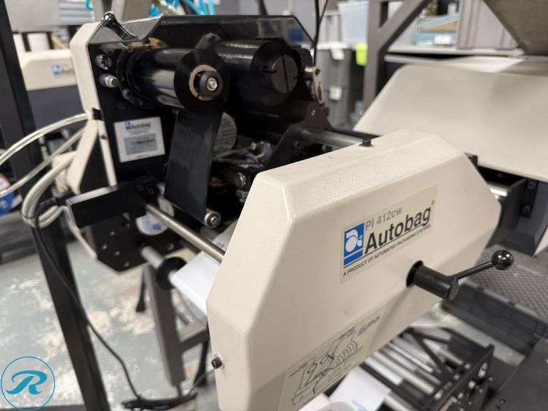 Autobag PI412CW Labeler and Autobag AB180 Sealer with Auto Feed Station and Ohlson Control Unit - Roller Auctions