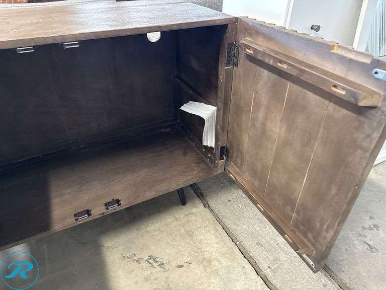 Wooden Cabinet With Geometric Carved Front Panel, 58 in x 18 in - Roller Auctions