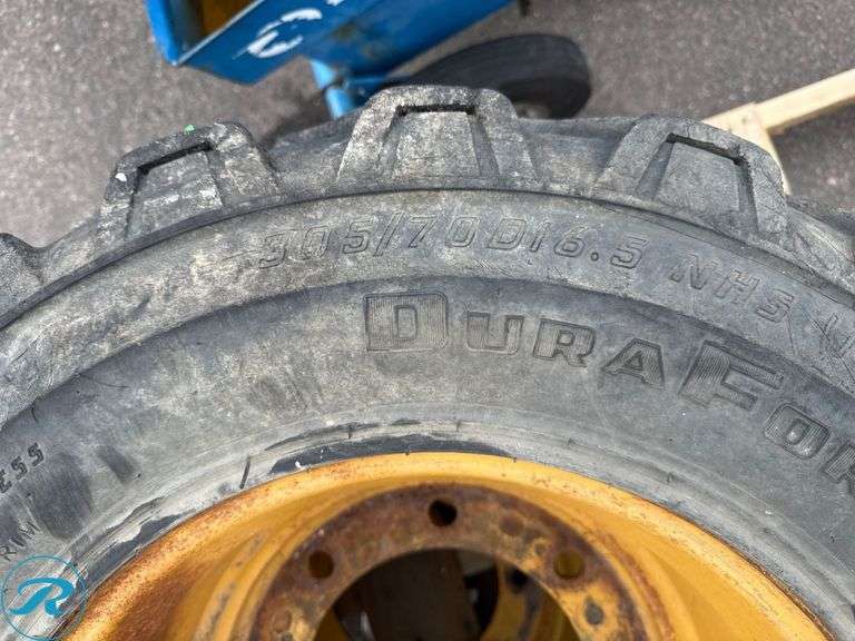 (2) Firestone 12-16.5 Equipment Tires with Wheels - Roller Auctions