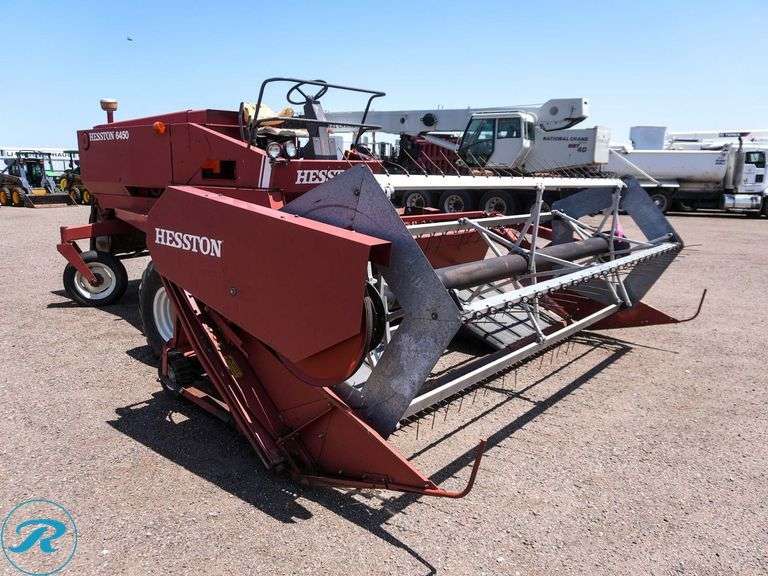 Heston 6450 Swather, ( Unit has a Blown Hydraulic Hose And Needs Replaced) - Roller Auctions