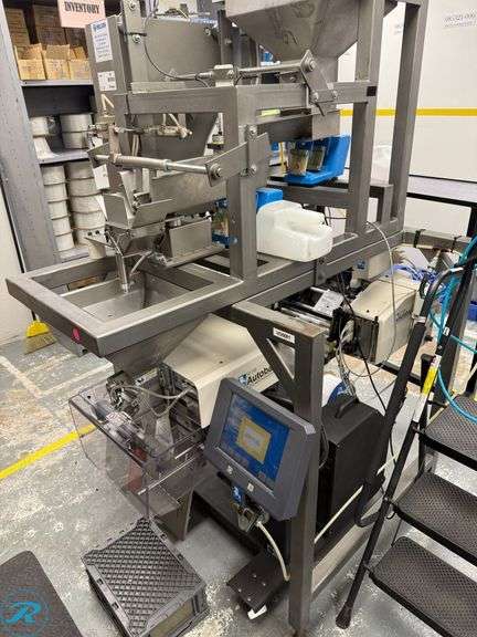 Autobag PI412CW Labeler and Autobag AB180 Sealer with Auto Feed Station and Ohlson Control Unit - Roller Auctions