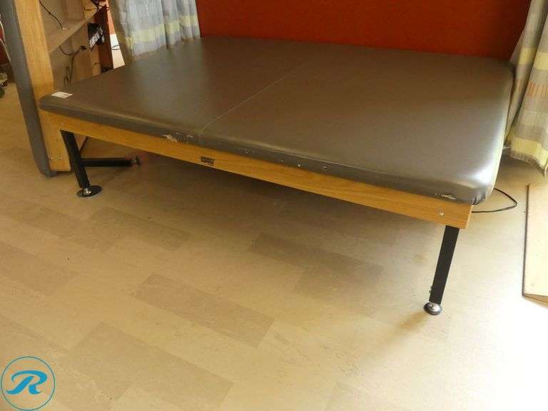 Direct Supply Adjustable Height Treatment Table