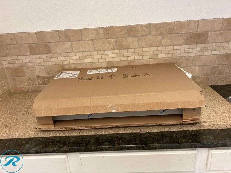 (1) New- Frigidaire 30 inch Convertible 230-CFM Stainless Steel Wall-Mounted Range Hood with Charcoal Filter (total of 1 hood) (Has Some minor scratches See Photos) - Roller Auctions