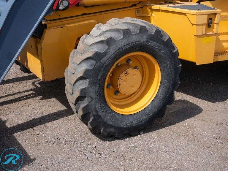 2015 John Deere 410K 4WD - Roller Auctions