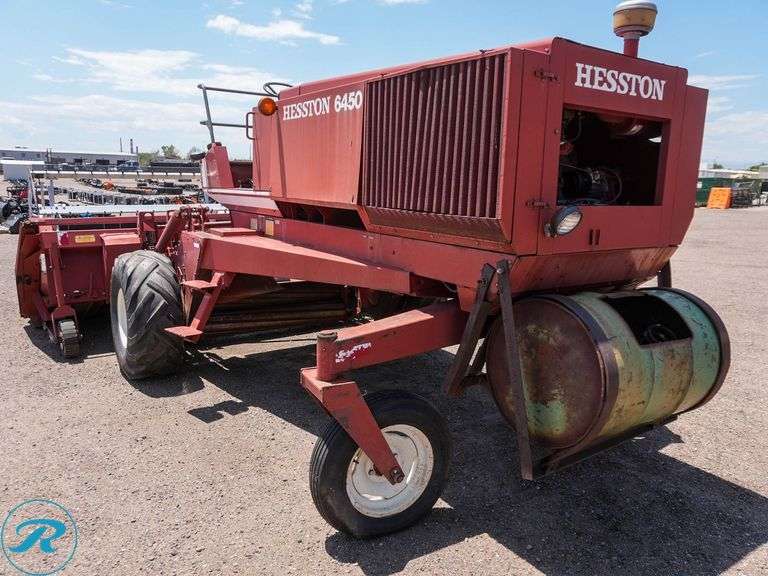 Heston 6450 Swather, ( Unit has a Blown Hydraulic Hose And Needs Replaced) - Roller Auctions
