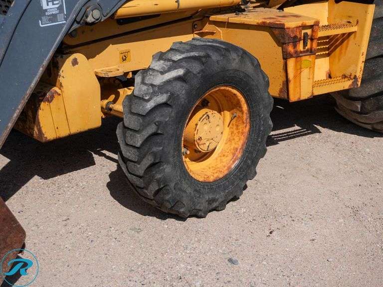 2010 John Deere 410J 4WD Loader/Backhoe - Roller Auctions