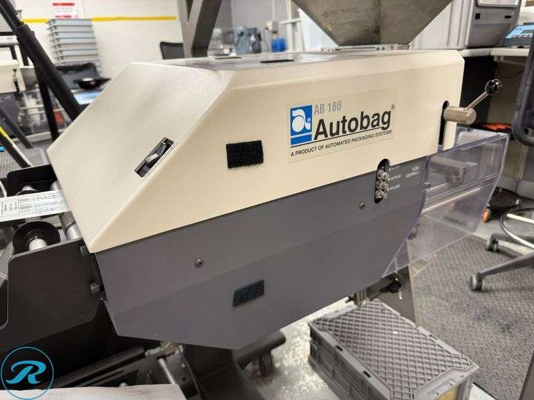 Autobag PI412CW Labeler and Autobag AB180 Sealer with Auto Feed Station and Ohlson Control Unit - Roller Auctions