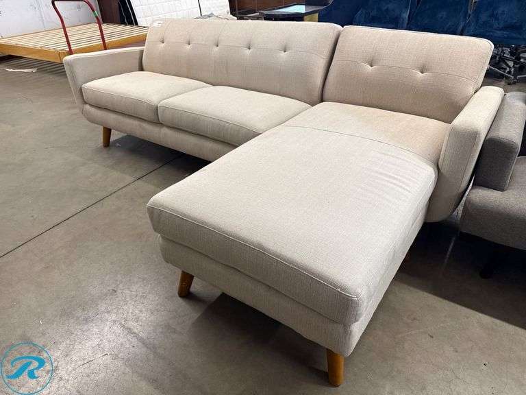 Right-Facing Beige Upholstered Sectional Sofa with Wood Legs, ( Signs of Sun Fading on the fabric ) - Roller Auctions