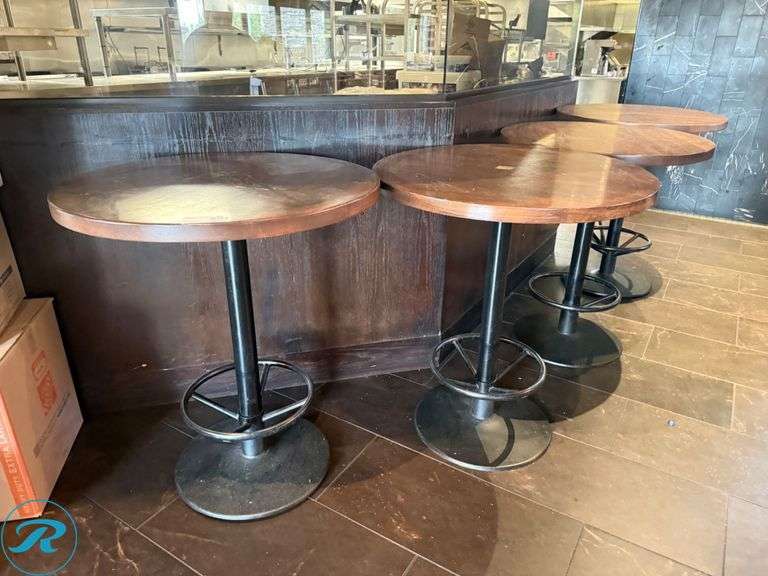 (4) 36in Round Wood Bar Tables with Black Metal Pedestal Bases - Roller Auctions
