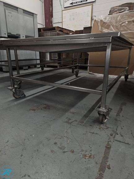 Stainless Steel 41″×64″ Drain Table on Casters - Roller Auctions