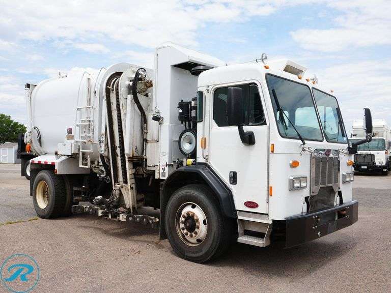 2015  Peterbilt  320   S/A Side Loader Trash Truck