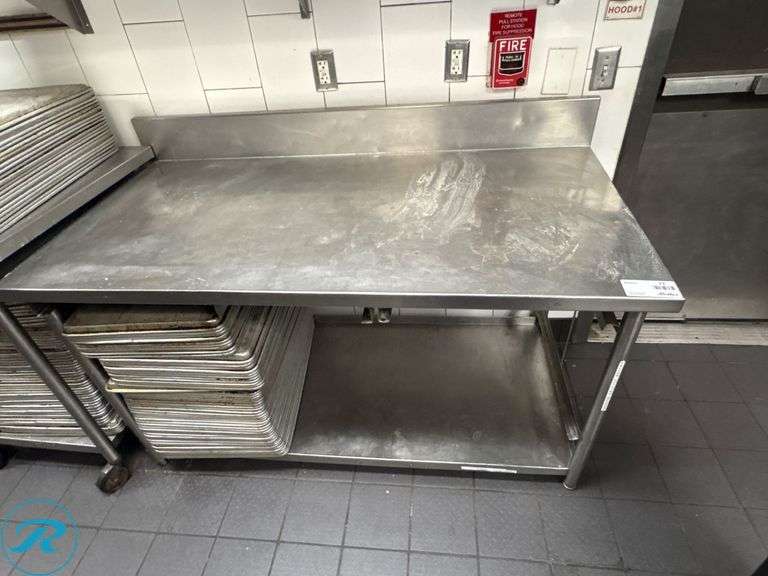 Stainless Steel Work Table with Lower Shelf and 6″ Backsplash, 60″ x 30″ x 35″H - Roller Auctions