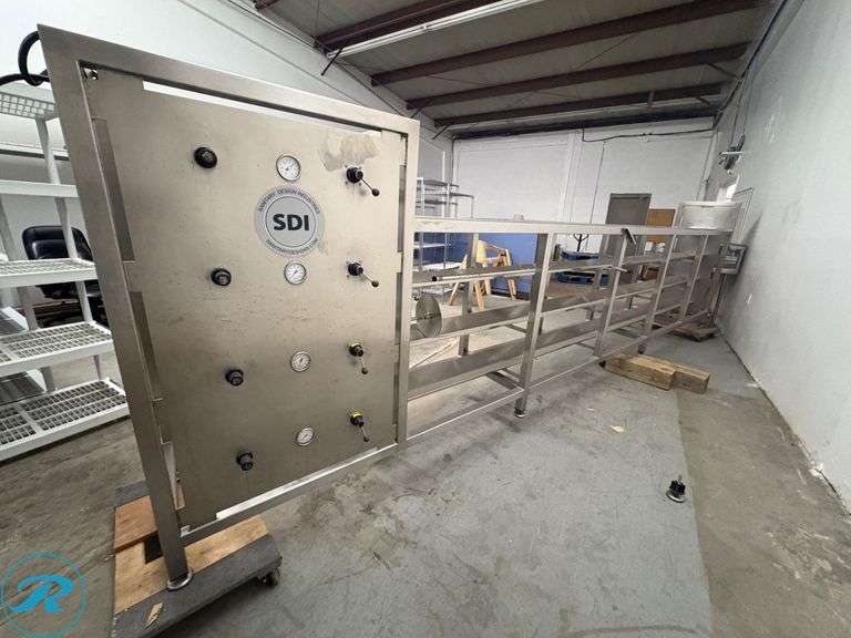 Pneumatic Cheese Press by Sanitary Design Industries