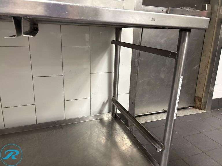 Stainless Steel Work Table with Lower Shelf and 6″ Backsplash, 60″ x 30″ x 35″H - Roller Auctions