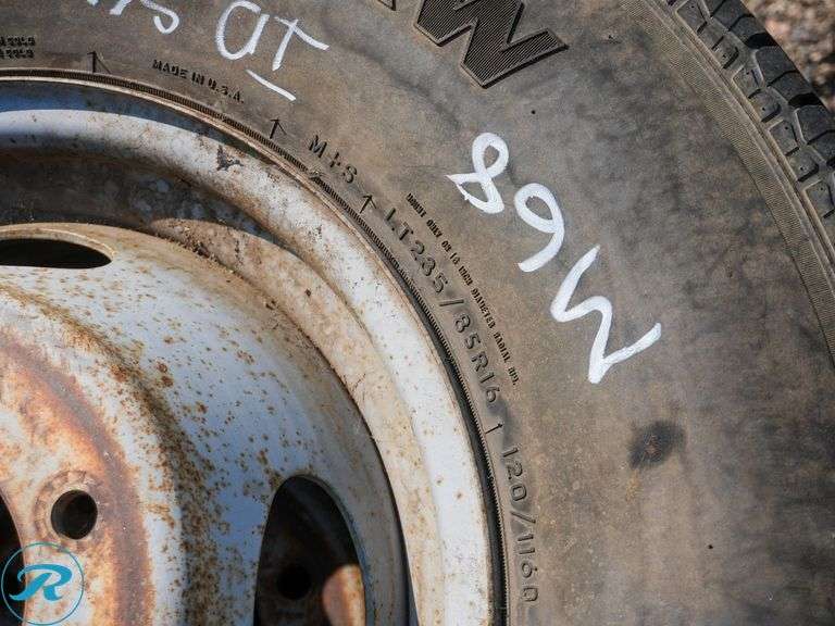 (2) 2006 General Grabber AW Tires with Rims, 235/85R16 - Roller Auctions