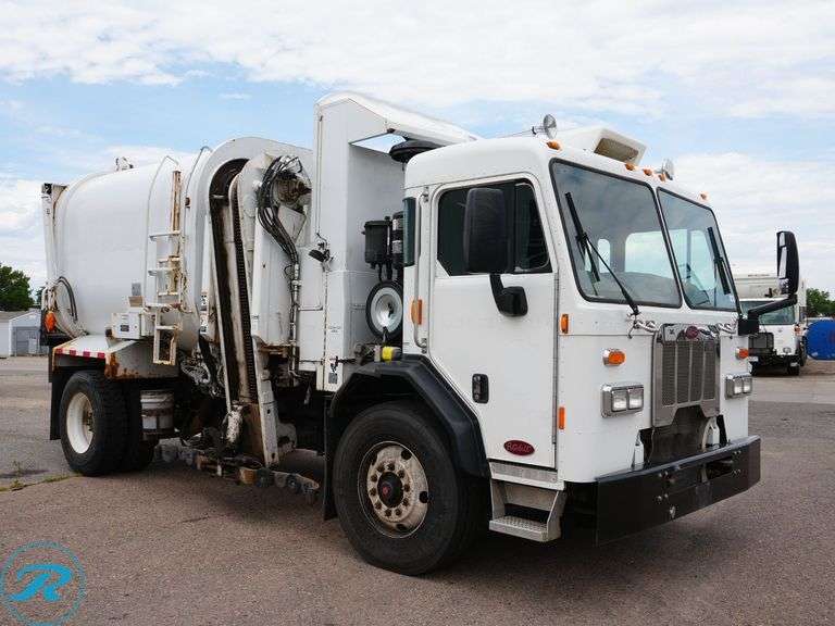 2015  Peterbilt  320   S/A Side Loader Trash Truck