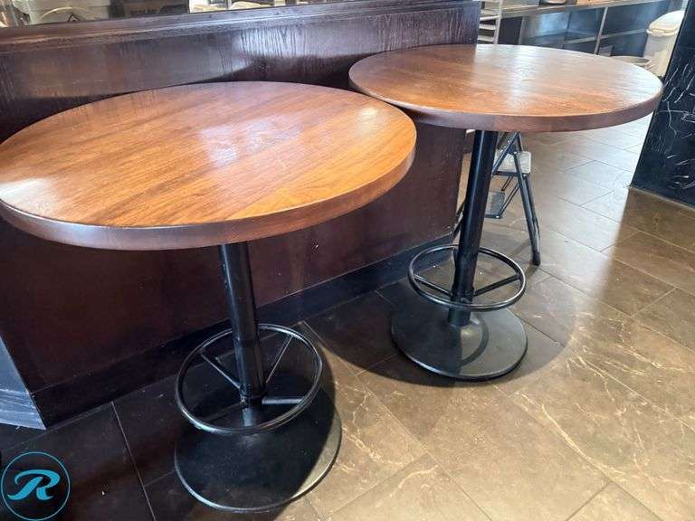 (4) 36in Round Wood Bar Tables with Black Metal Pedestal Bases - Roller Auctions