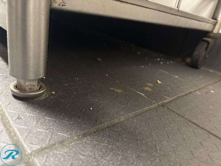 Stainless Steel Work Table with Lower Shelf and 6″ Backsplash, 60″ x 30″ x 35″H - Roller Auctions