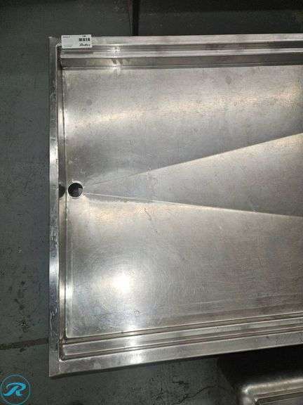 Stainless Steel 41″×64″ Drain Table on Casters - Roller Auctions