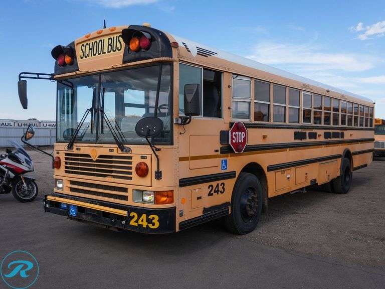 2010 International RWD 64-Passenger School Bus - Roller Auctions