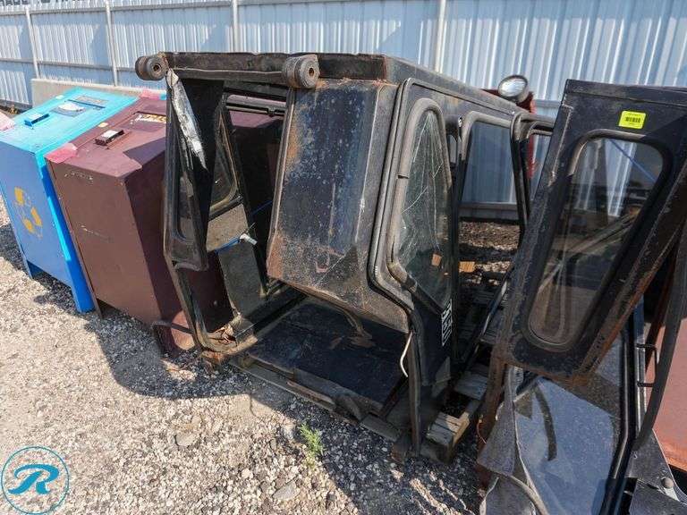 Cozy Tractor Cab with Glass Panels - Roller Auctions