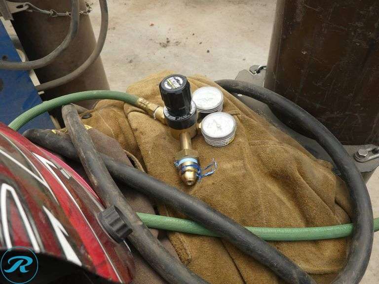 Lincoln Electric Power MIG 255 Mig Welder with Gas Cylinders and Helmet, 208/230V, Single Phase - Roller Auctions
