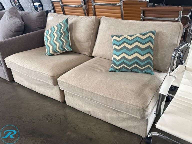 2 Beige Upholstered Sectional Sofa Chairs with Chevron Accent Pillows