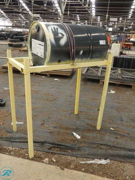 Drum Dispenser Stand with 55-Gallon Drum of John Deere Hydraulic Fluid (1/4 Full) - Roller Auctions
