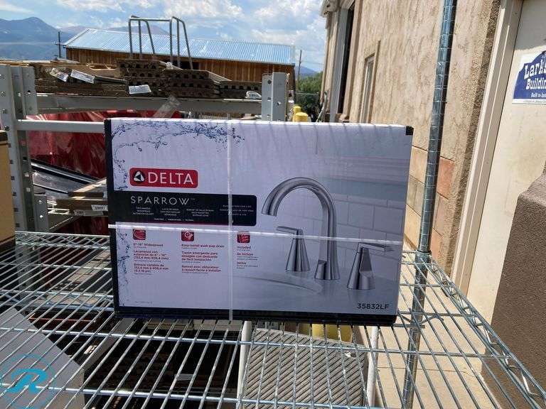 (1) New- Delta Sparrow Chrome Widespread 2-handle WaterSense Mid-arc Residential Handle Bathroom Sink Faucet with Drain (total of 1 faucet) - Roller Auctions