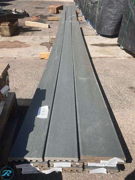 (13) New- (9) Trex Enhance basic 1" x 6"  x 20 ft Clam Shell grooved composite deckboard (2) Trex Enhance basic 1" x 6"  x 12 ft Clam Shell grooved composite deckboard (2) Trex Enhance basic 1" x 8"  x 12 ft Clam Shell grooved fascia deckboard - Roller Auctions