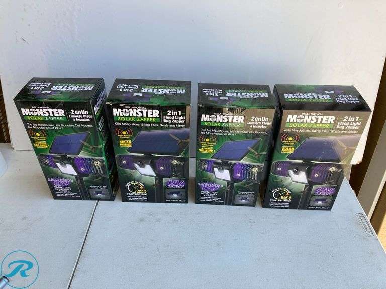 (4) New- BELL + HOWELL 110 -Degree 3 -Wattage Equivalent Solar LED Black 1 -Head Motion-Activated Flood Light with Timer (total of 4) - Roller Auctions
