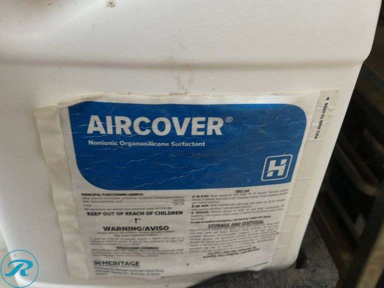 Tray of Spray Additives Including Aircover, Revive, and Mystic SPI Blue - Roller Auctions