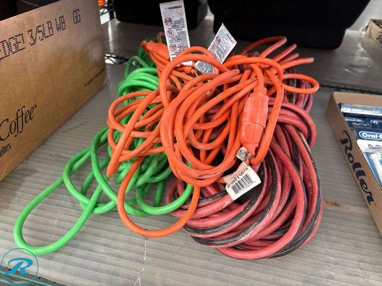 (4) Assorted Extension Cords in Red, Green, and Orange