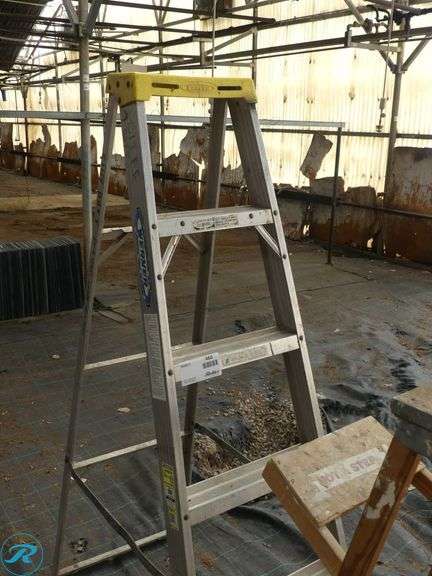 (2) Step Ladders: Werner 6′ Aluminum Ladder and 4′ Wooden - Roller Auctions