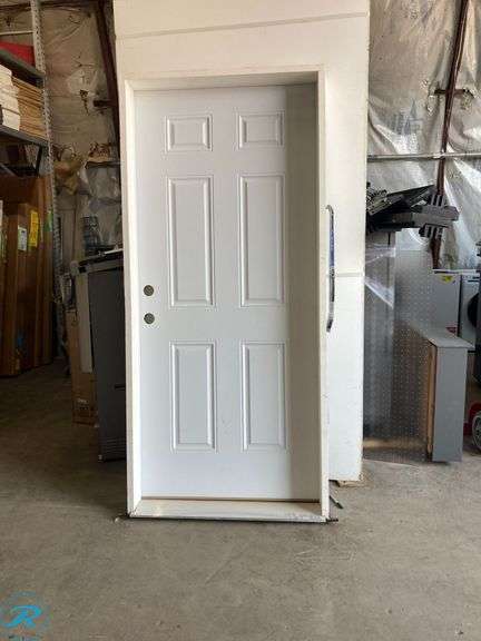 (1) New- Reliabilt 36" x 80" x 6 9/16" Steel no glass right hand Inswing primed prehung front door with Brickmould insulating core (some damage in frame see Photos) (Total of 1) - Roller Auctions